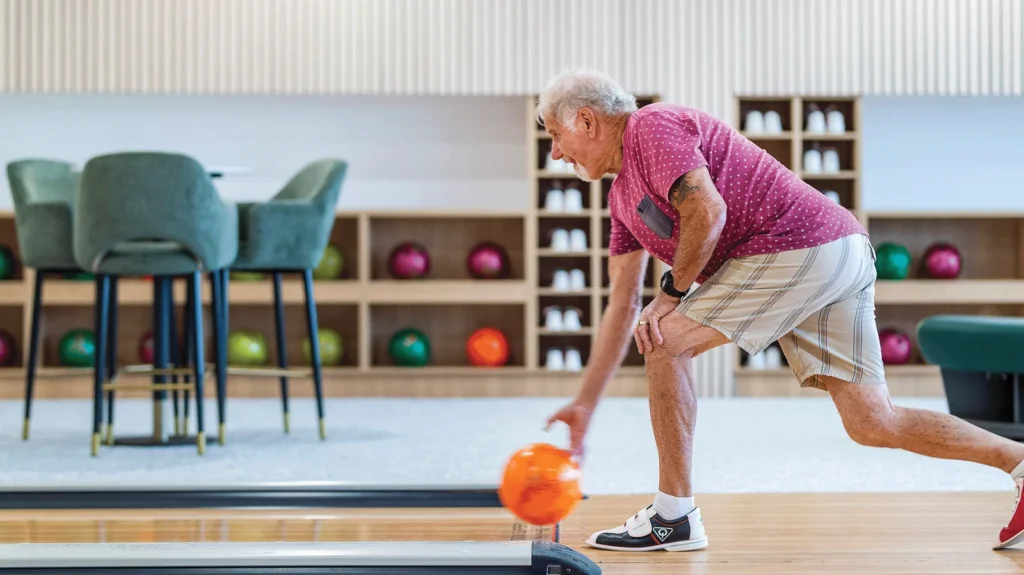Homeowner enjoying tenpin bowling at Palm Lake Resort Bargara